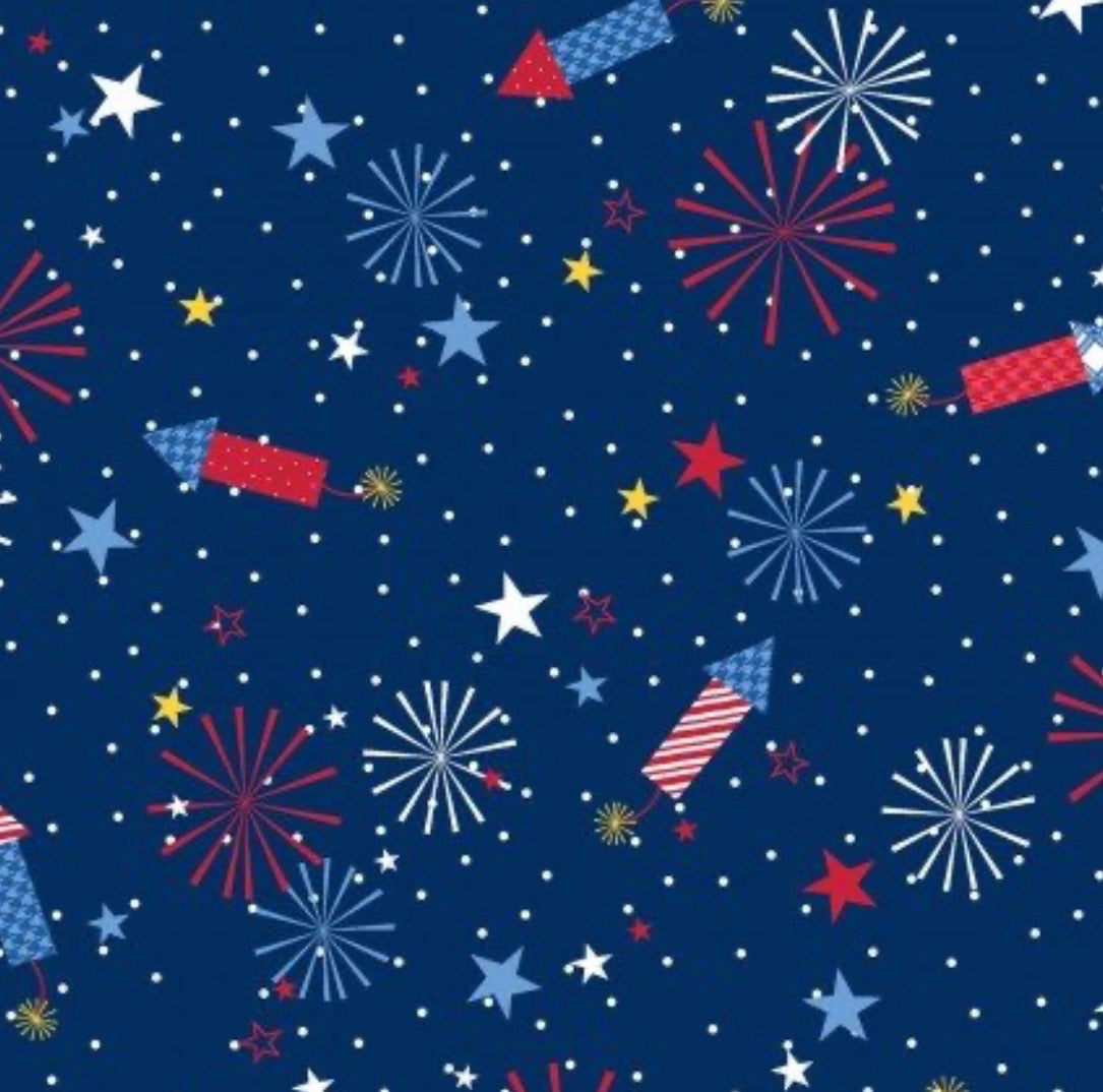 Pattern of fireworks and stars on a dark blue background